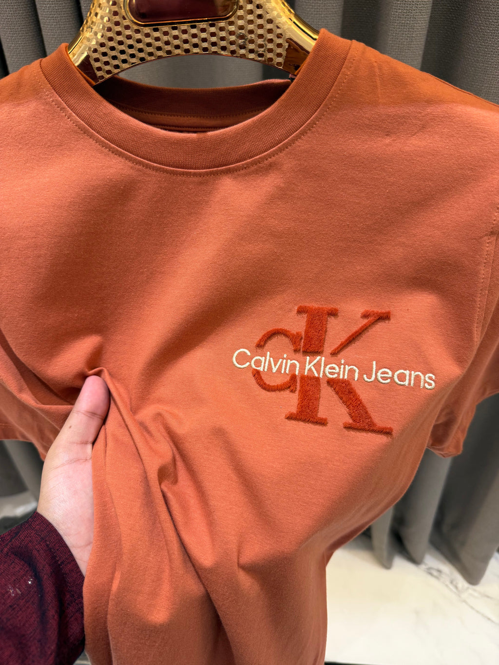 CALVIN KLEIN LIGHT ORANGE EMBOSSED PRINTED TSHIRT C1
